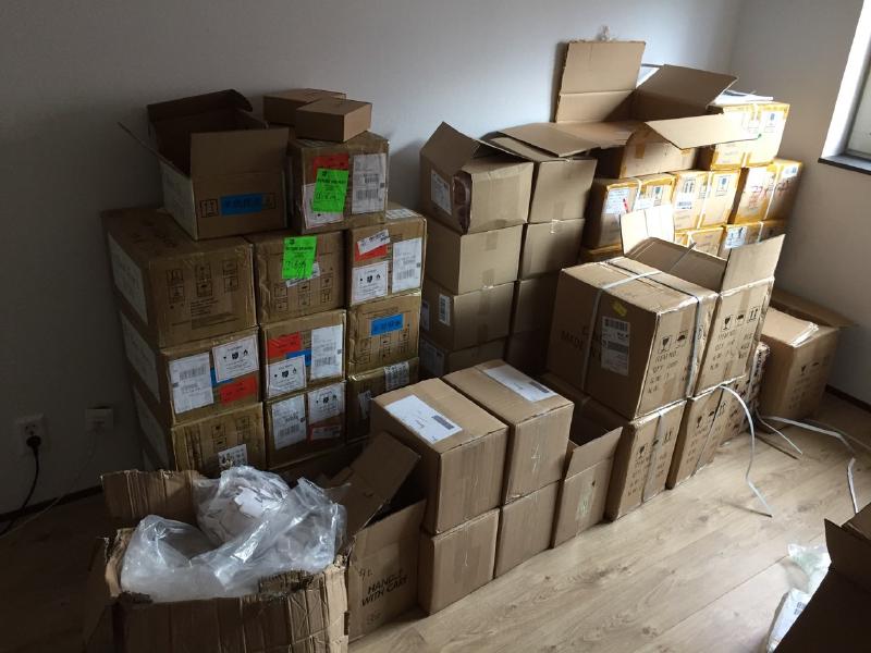Boxes of badges and parts.